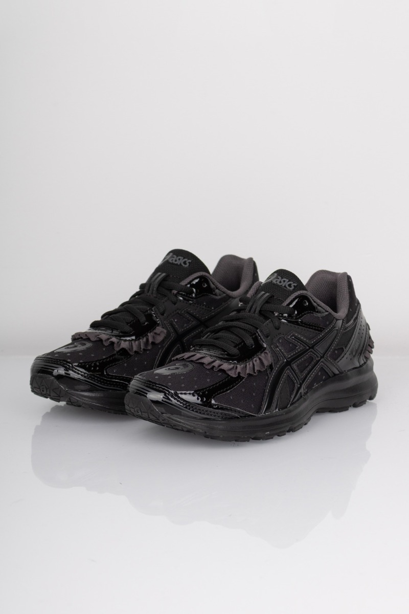 Asics Sneakers Jog 100s - Sort med feminine detaljer
